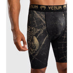 Venum-05335-603 Santa Muerte 5.0 Men’s Vale Tudo Short M/L Deep Black Gold