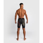 Venum-05335-603 Santa Muerte 5.0 Men’s Vale Tudo Short M/L Deep Black Gold