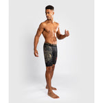 Venum-05335-603 Santa Muerte 5.0 Men’s Vale Tudo Short M/L Deep Black Gold