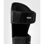 VENUM-1394-536 ELITE MUAY THAI BOXING MMA SCHIENBEINSCHÜTZER Größe M Schwarz Camo