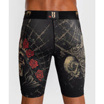 Venum-05335-603 Santa Muerte 5.0 Men’s Vale Tudo Short M/L Deep Black Gold