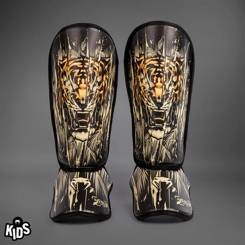 VENUM-05381-117 KIDS TIGER SHIN GUARD PROTECTOR Size S-L Black Neon Orange