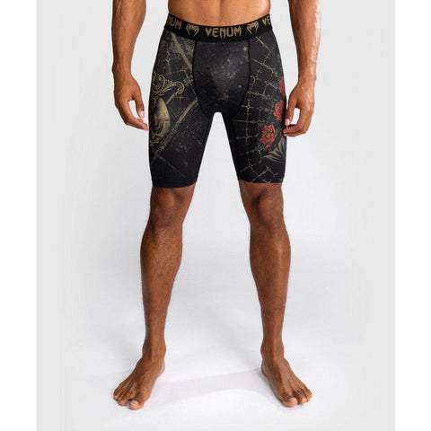 Venum-05335-603 Santa Muerte 5.0 Men’s Vale Tudo Short M/L Deep Black Gold