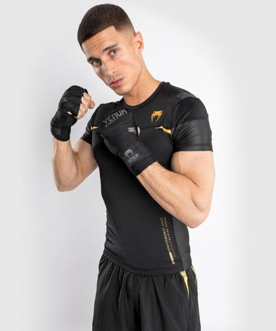 VENUM-04306-126  TEMPEST 2.0 MMA Muay Thai Boxing Rashguard Compression T-shirt - SHORT SLEEVES XS-XXL Black Gold